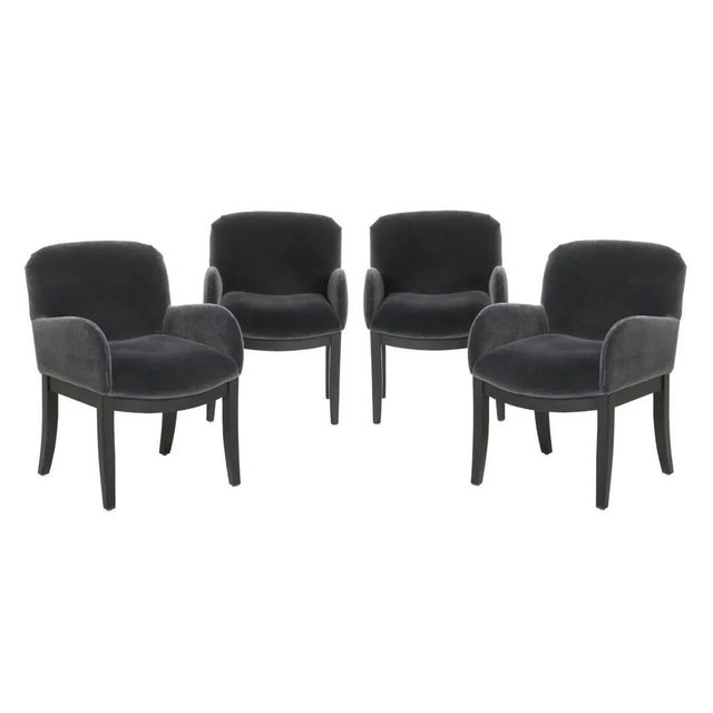 Super sleek and sexy set of eight dining arm chairs model #1277 by the iconic Mid-Century Modern designer Milo Baughman...