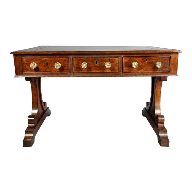 With rectangular brown leather top and crossbanded edge over three drawers on one side and two on the opposing side,...