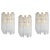 Each wall light is composed of 9 crystal glasses and a gilt brass frame design in venini style, italy. Manufactured circa...