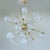 Italian modern sputnik chandelier with opaline Murano glass shades mounted on unlacquered natural brass frame / Made in...