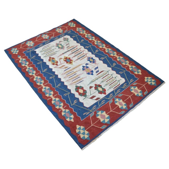 This rug with a wheat ear pattern, which is the symbol of abundance and fertility, was made in Oushak in the 1980s....