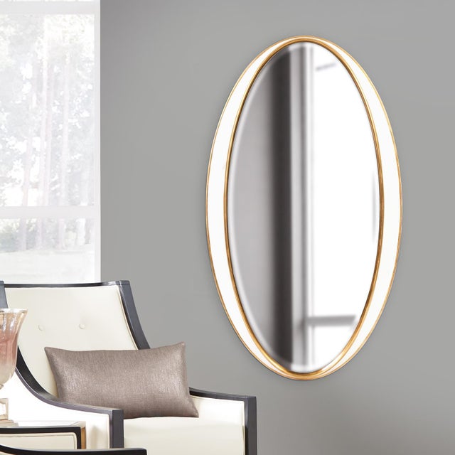 Our Rania Mirror is a striking piece featuring a simple oval frame. The finish is what makes this mirror stand out from...