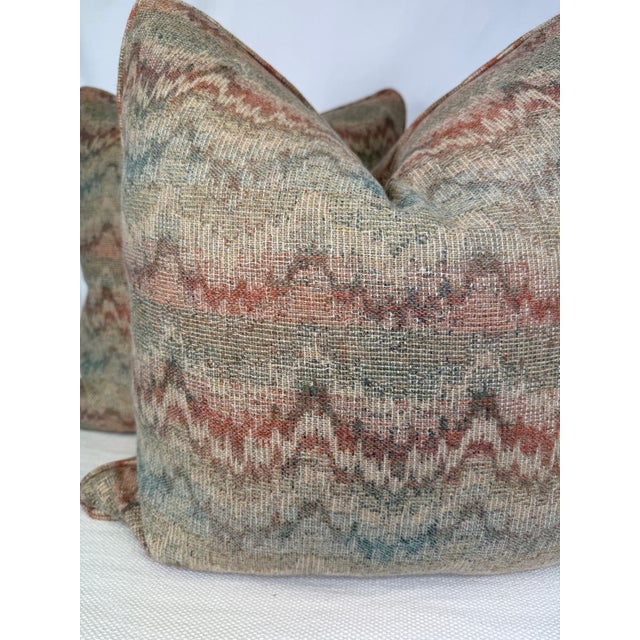 Custom pair of 22" pillows covered in Kirby Designs "Flame Wool" in color rust. These pillows have tapered corners to...