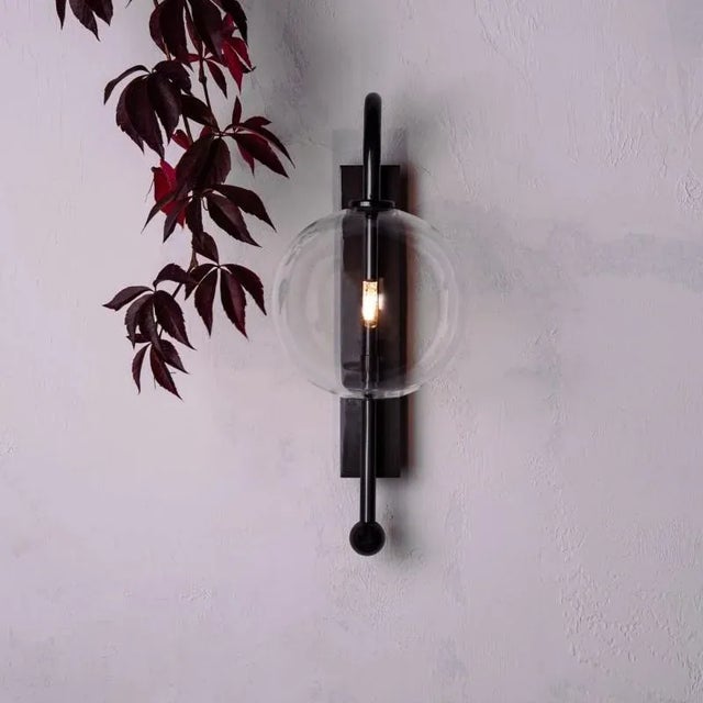 Black gunmetal wall sconce by schwung dimensions: d 23.2 x w 15 x h 37.1 cm materials: solid brass, hand-blown glass...