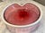 Gorgeous mid-century art glass bowl attributed to Murano. The organic, softly folded and swirled form is sculpted in a...