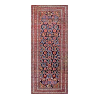 Striking Bold Colors in a Navy Background Antique Persian Malayer Gallery Rug For Sale