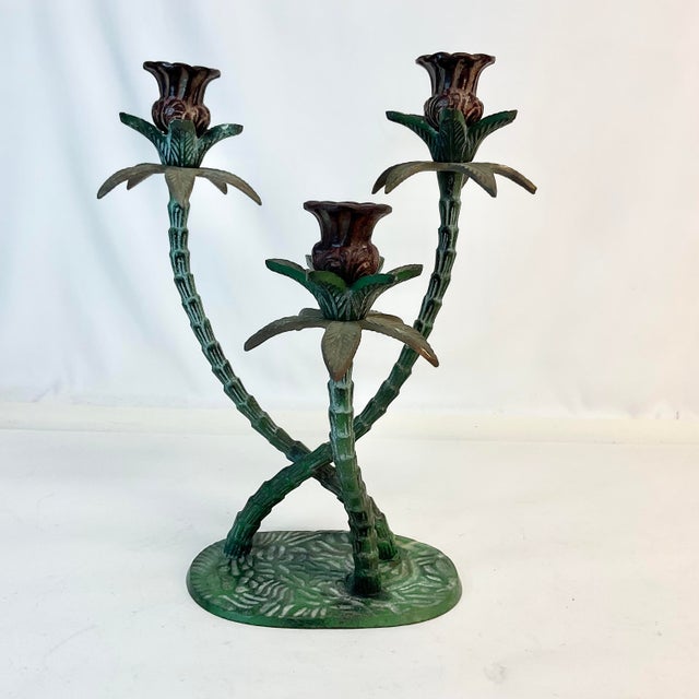 We have come across plenty of metal-cast Tole palm tree candleholders over the years, but none have been as stunning as...