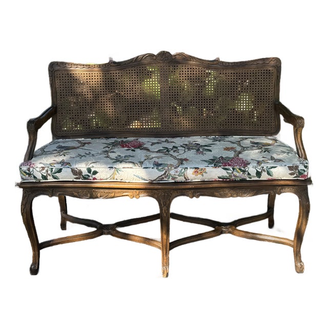 1940s Century Furniture French Provincial Cane-Back Bench With Carved Wood Frame and Floral Upholstered Seat For Sale