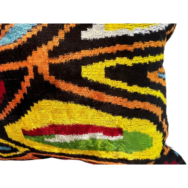 Handmade Velvet Silk IKAT cushion cover with tribal design and multicolor. It can be a perfect gift for new homes. This...