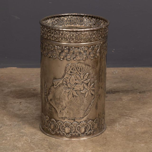 Antique 20th Century silver plated waste paper bin, decorated throughout with a stylised embossed Art Deco design....