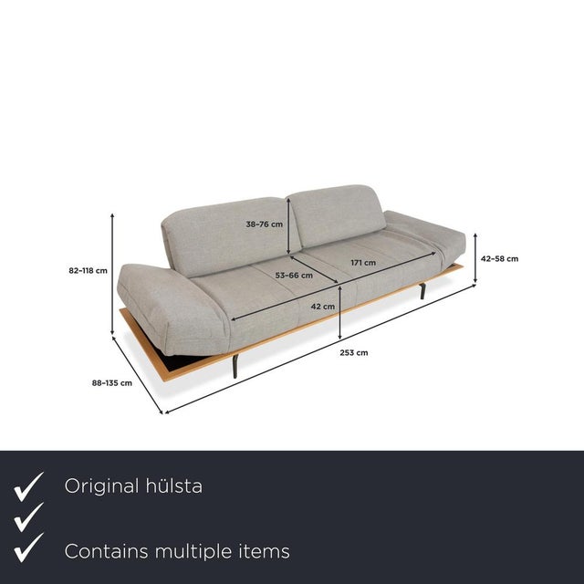 hülsta HS.420: Floating Lightness with a Wooden Accentuation. This sofa from the quality brand hülsta is a masterpiece of...