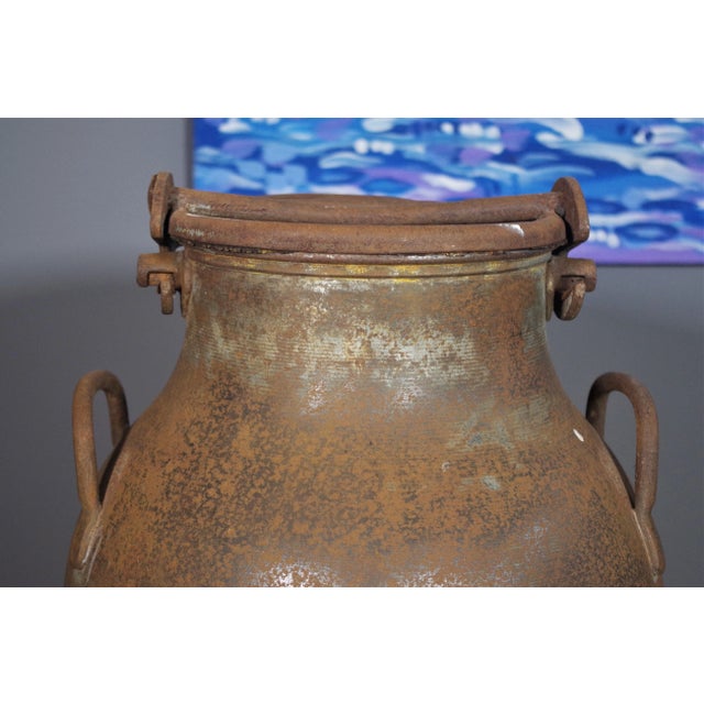 Sancson milk container in the 1950s, iron.