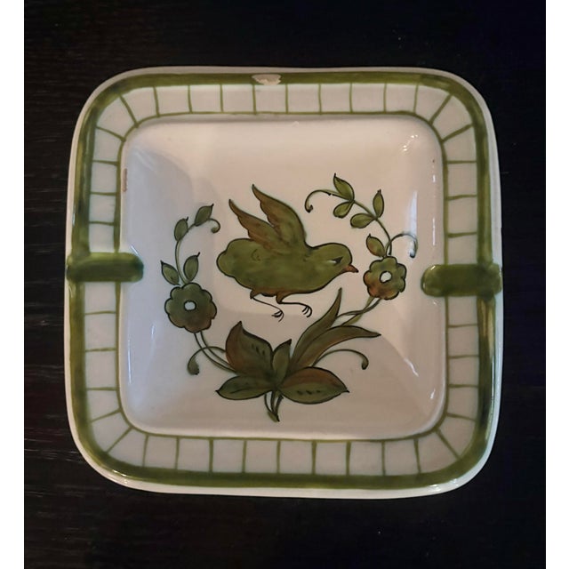 This handsome pair of vintage hand painted ashtrays with a bird motif are 1.25” high by 5.75” square. The great thing...