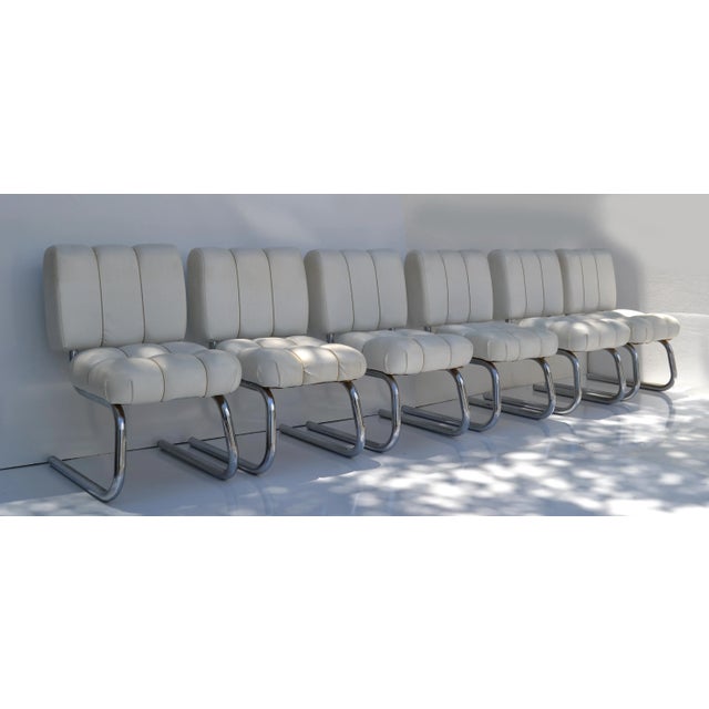 Superb set of 6 American tubular Chrome, Vinyl & Cord Cantilever Dining Chairs made by B. Brody Seating Company in the...