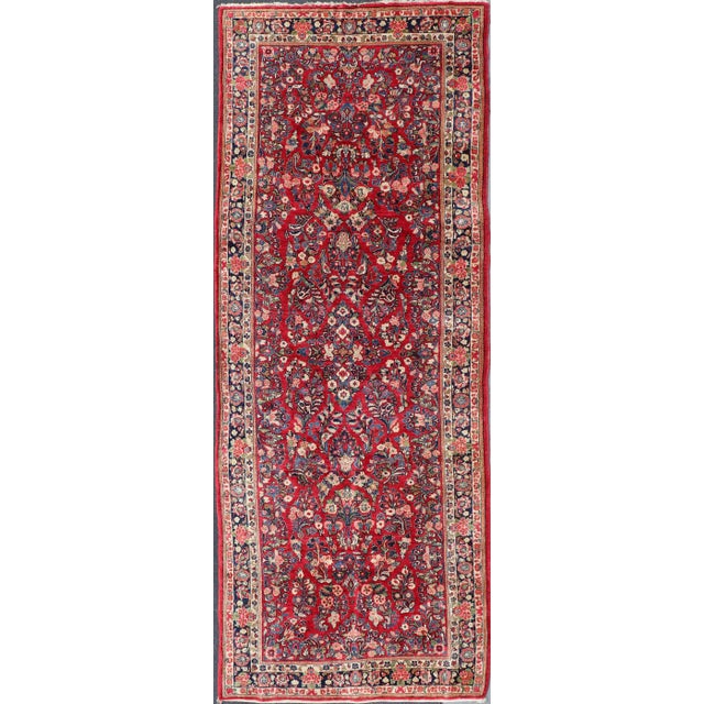 Antique Sarouk Long Gallery Runner With All-Over Flower Design in Red Background For Sale - Image 12 of 12