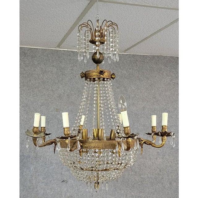 Hot air balloon or basket chandelier, Louis XV style, circa 1900 Bronze and brass structure with 8 lights Glass pendants...
