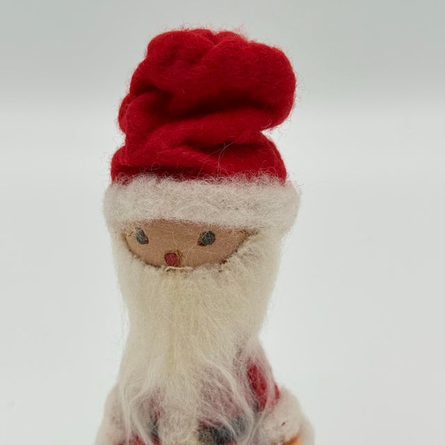 This charming mid-century German Santa brings a cozy, folk-art feel to your holiday décor. Made in West Germany circa...