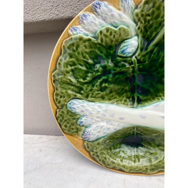 Unusual 19th century majolica asparagus plates with large green cabbages leaves on a yellow background (usually on blue...