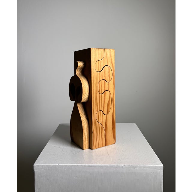 Playful and Sculptural 3D pine puzzle "The Linné Family" by Swedish artist Gunnar Kanevad, 1970s. This piece has an...