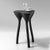 Side table "TRIPOD", black A fusion of sturdiness and elegance, archaism, and modernity, is a distinctive feature of...