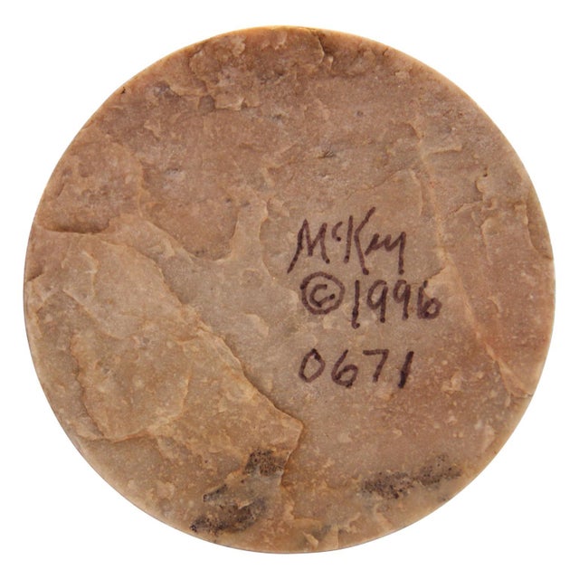 Modern abstract mixed media sculpture by Texas artist McKay Otto. The work features steel arms twisting out of a wood...