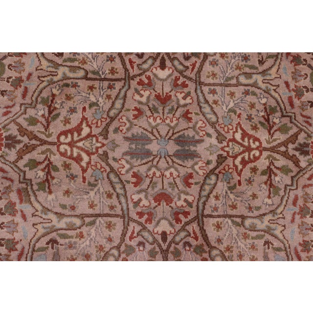 Designed with mesmerizing intricacy and gorgeous color palette, this hand-knotted masterpiece demonstrates the beauty and...
