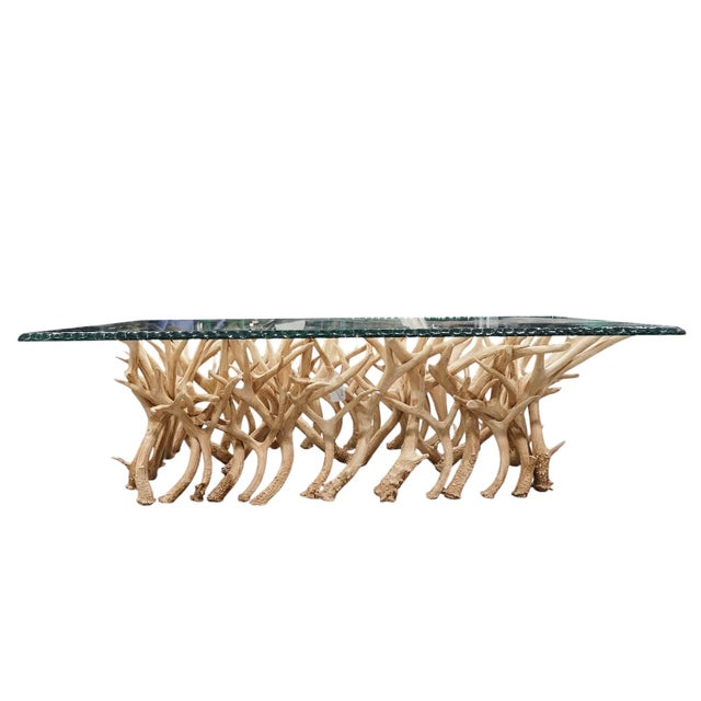 This Rare Large American Faux Antler Base Etched Glass Top Coffee Table is a unique and stylish addition to any living...