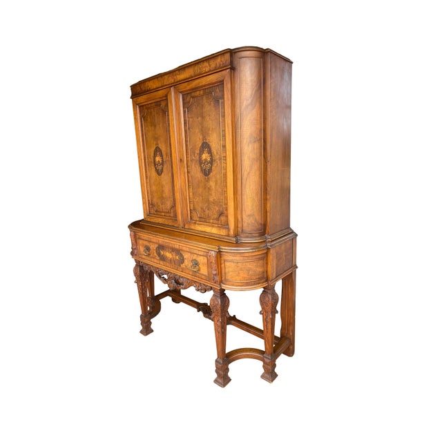 For your consideration, this stunning enclosed cabinet hutch presents a blend of Spanish Revival and Jacobean styles with...