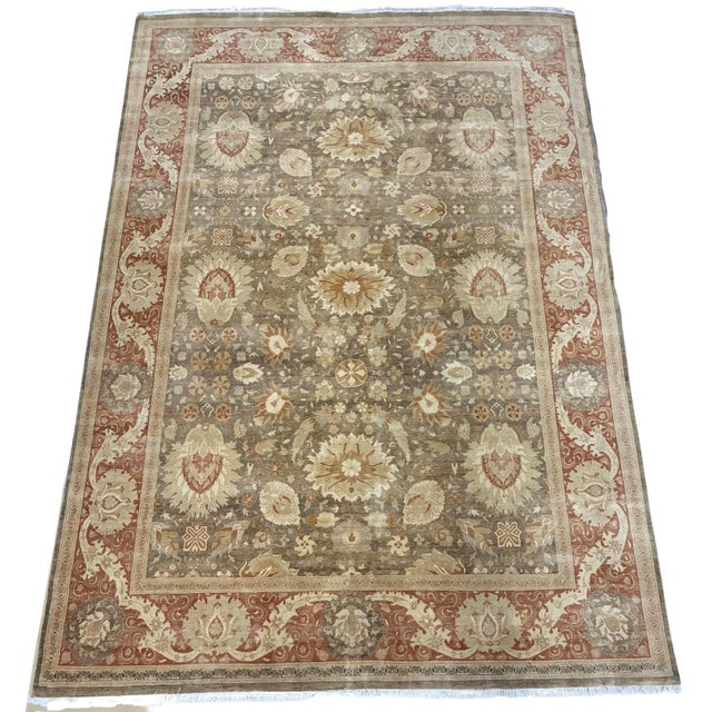 An impressive room-size hand-knotted area rug featuring an elaborate allover floral design inspired by traditional Oushak...