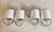 Elegant pair of Bit Wall sconces by The Urban Electric Co., finished in polished nickel and paired with crisp white linen...