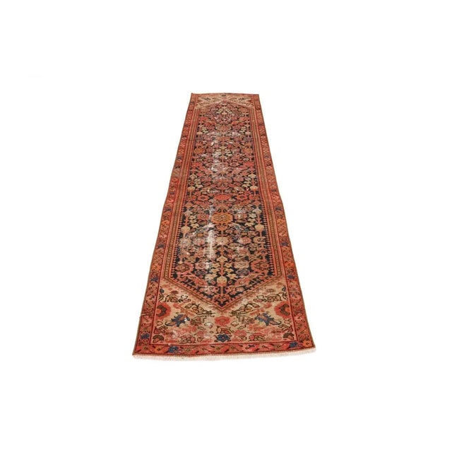 Antique distressed handknotted Persian Malayer runner. Approximately 100-120 years old. In good condition.