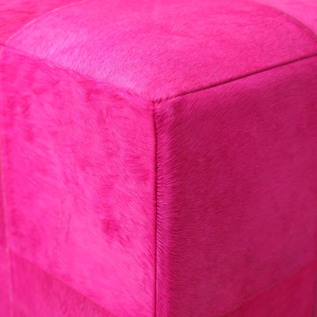 "Bold, unapologetic, and undeniably luxurious, this handmade cowhide leather pouf is designed for interiors that embrace...