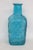 This gorgeous vase / bottle is made of glass. This piece has lovely vintage style, it features a beautiful cerulean blue...