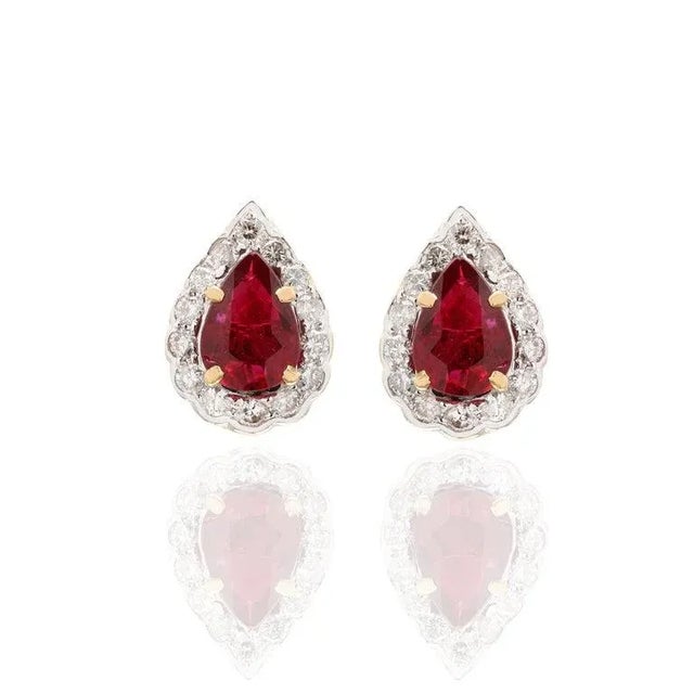 Modern Pear Cut Ruby Amidst Halo Diamond Studs Handcrafted in Solid 18k Yellow Gold - 2 Pieces For Sale - Image 3 of 4