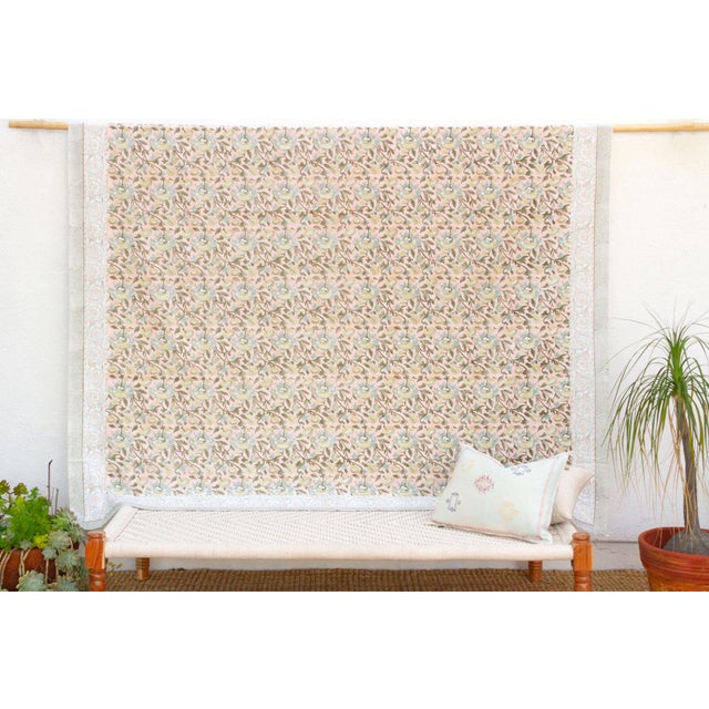 Drift into dreams with the serene beauty of our light Indian coverlet, a charming centerpiece for your bedroom decor....