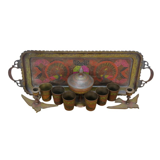 Ten vintage Indian brass etched and enameled serving pieces with a variety of floral designs, birds, and peacocks. Set...