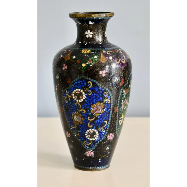 Antique (1920's) Cloisonné Vase has an Asian Style . Multi-Colored. The Measurements: 3.5" Round x 7"H. Flat rate Shipping...