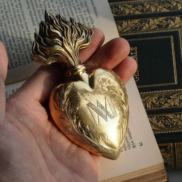 We are delighted to offer this enchanting solid silver gilt heart-shaped perfume bottle/flask made in france 19th c. Such...