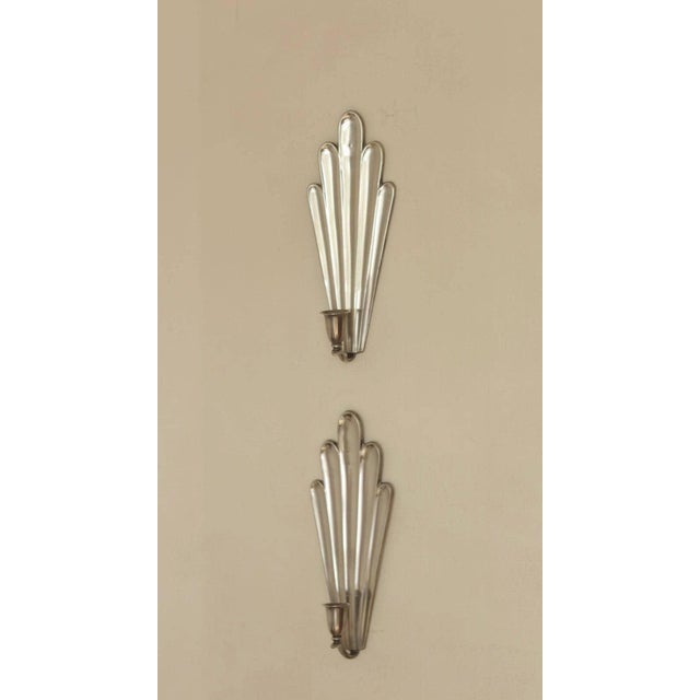 An amazing 1930's Pair Of Mid Century Swedish Grace style pewter sconces by C.G. Hallberg, Stockholm Both sconces are in...