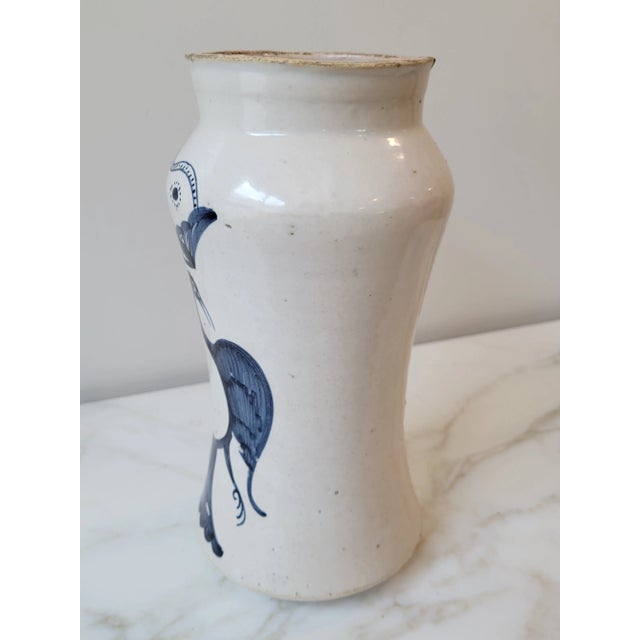 Antique Spanish pharmacy jars, called “albarelos”, were made for storing herbs and other substances used in making...