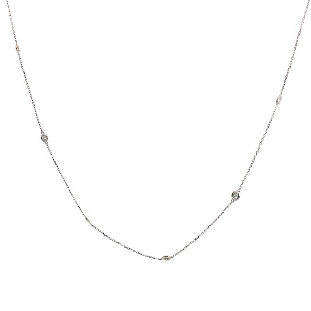 An iconic and timeless fine jewelry staple, this elegant "Diamonds by the Yard" station necklace is finely crafted in...