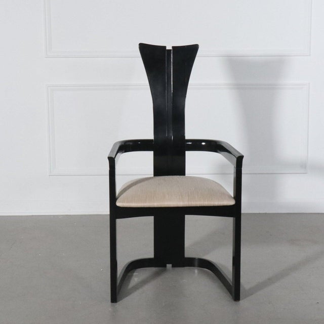 Fantastic set of sculptural high back barrel based armchair in the style of Tobia Scarpa. Black lacquered with a neutral...