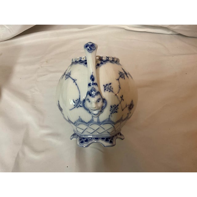Here is a Royal Copenhagen Blue Fluted Full Lace Small Teapot with Lid, Number 1/1118. This is rare, valuable, highly...