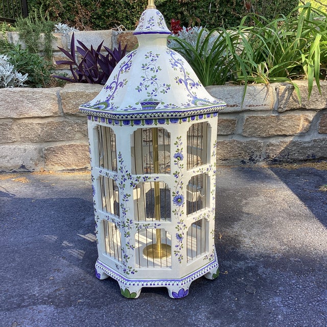 One-of-a-kind custom table lamp in a sculptural birdcage form, hand-painted with delicate florals in soft blue and green....