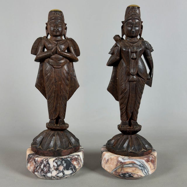 An extraordinary and rare pair of freestanding Asian sculptures depicting deities from the Hindu pantheon, attributed to...