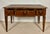 Elegant early 20th century walnut writing desk in the Louis XVI taste, featuring refined neoclassical lines and beautiful...