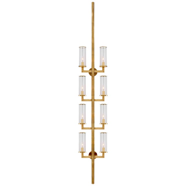 Liaison Statement Sconce in Antique-Burnished Brass with Clear Glass Designer: Kelly Wearstler Height: 84.25" Extension:...