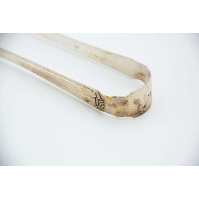 Silver Asparagus Tongs with Reliefs, in Good conditions. Designed 1920 to 1949
