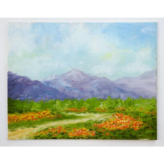 Oil on canvas board mountain and wildflowers landscape painting. Unsigned. Unframed, edge wear.