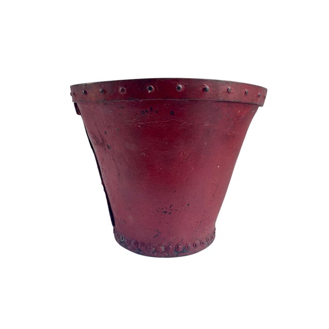 Gorgeous 19th-Century Georgian red leather fire bucket featuring a hand-painted armorial shield to front. These desirable...
